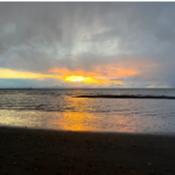 This photo shows the view of the ocean from Wreck beach in Vancouver