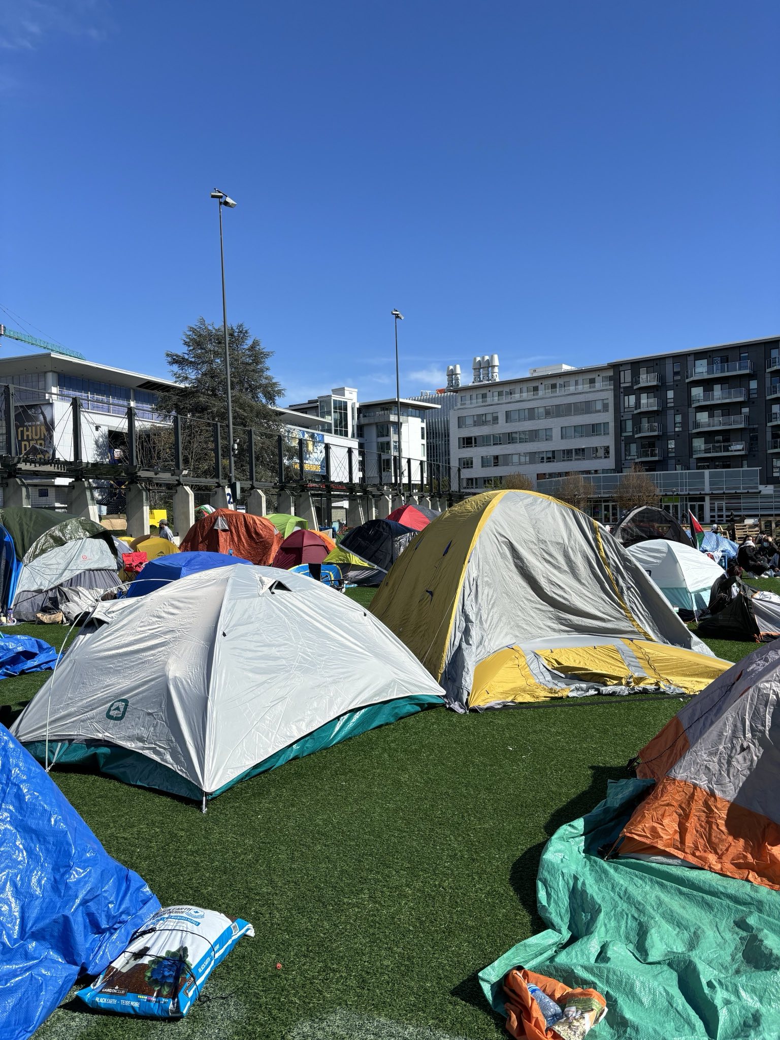 a group of tents set up in a field